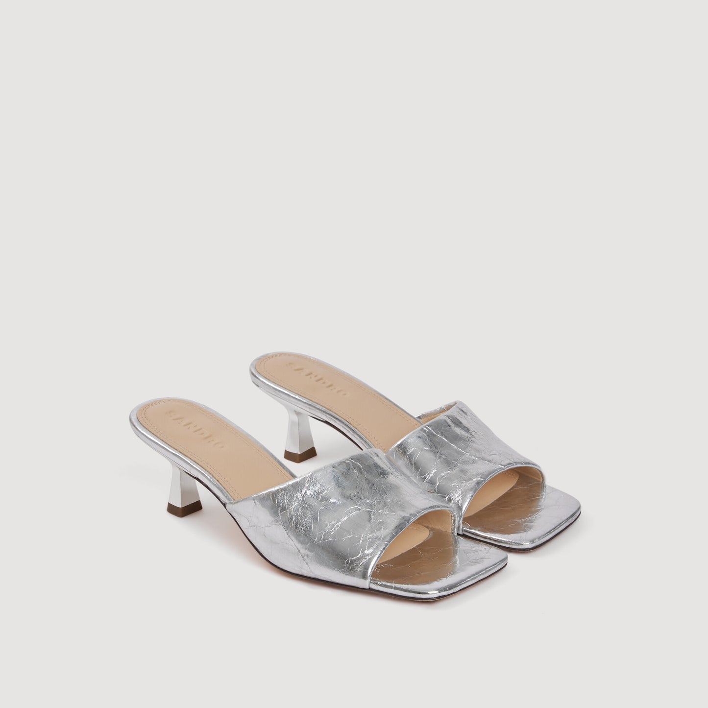 Heeled metallic leather mules