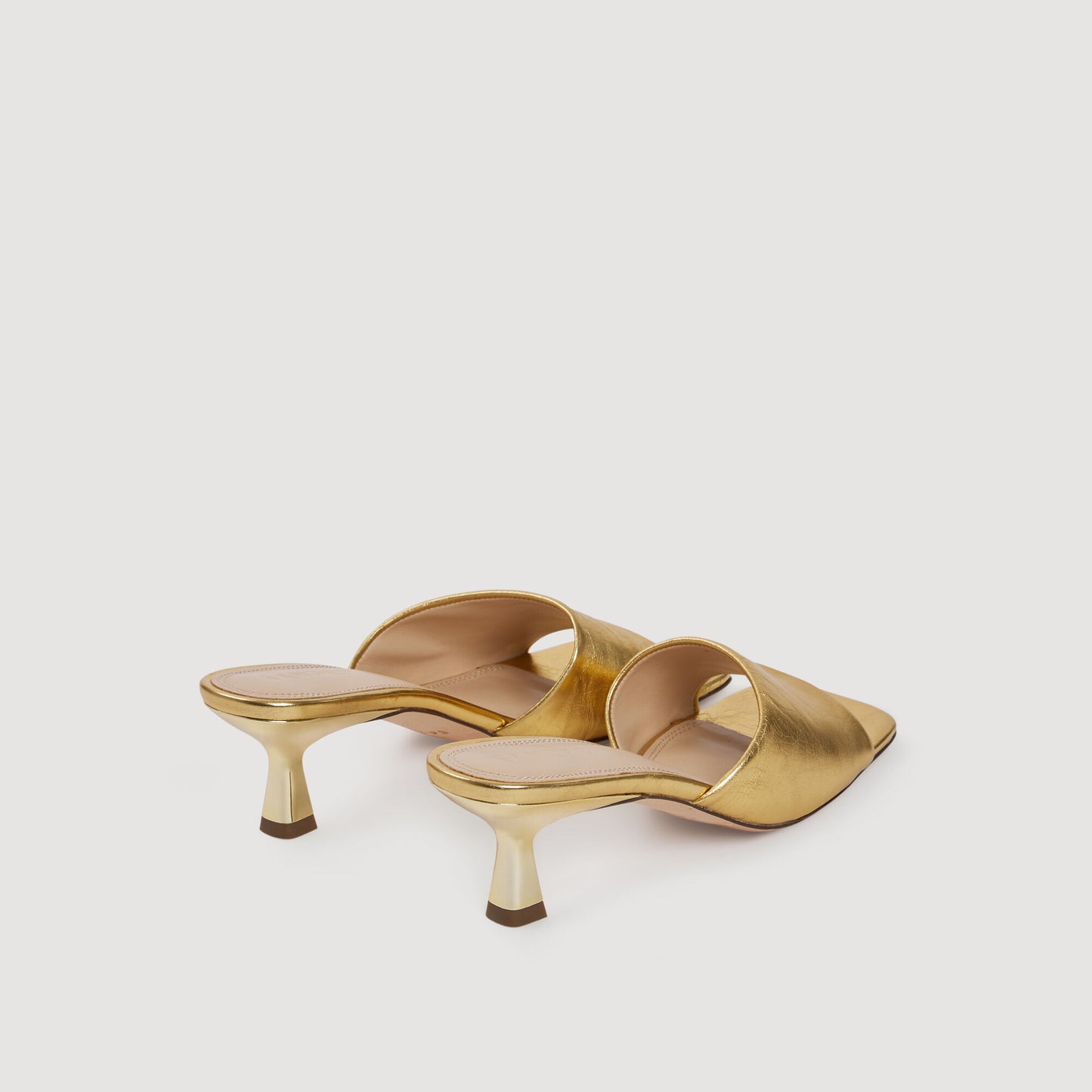 Heeled metallic leather mules