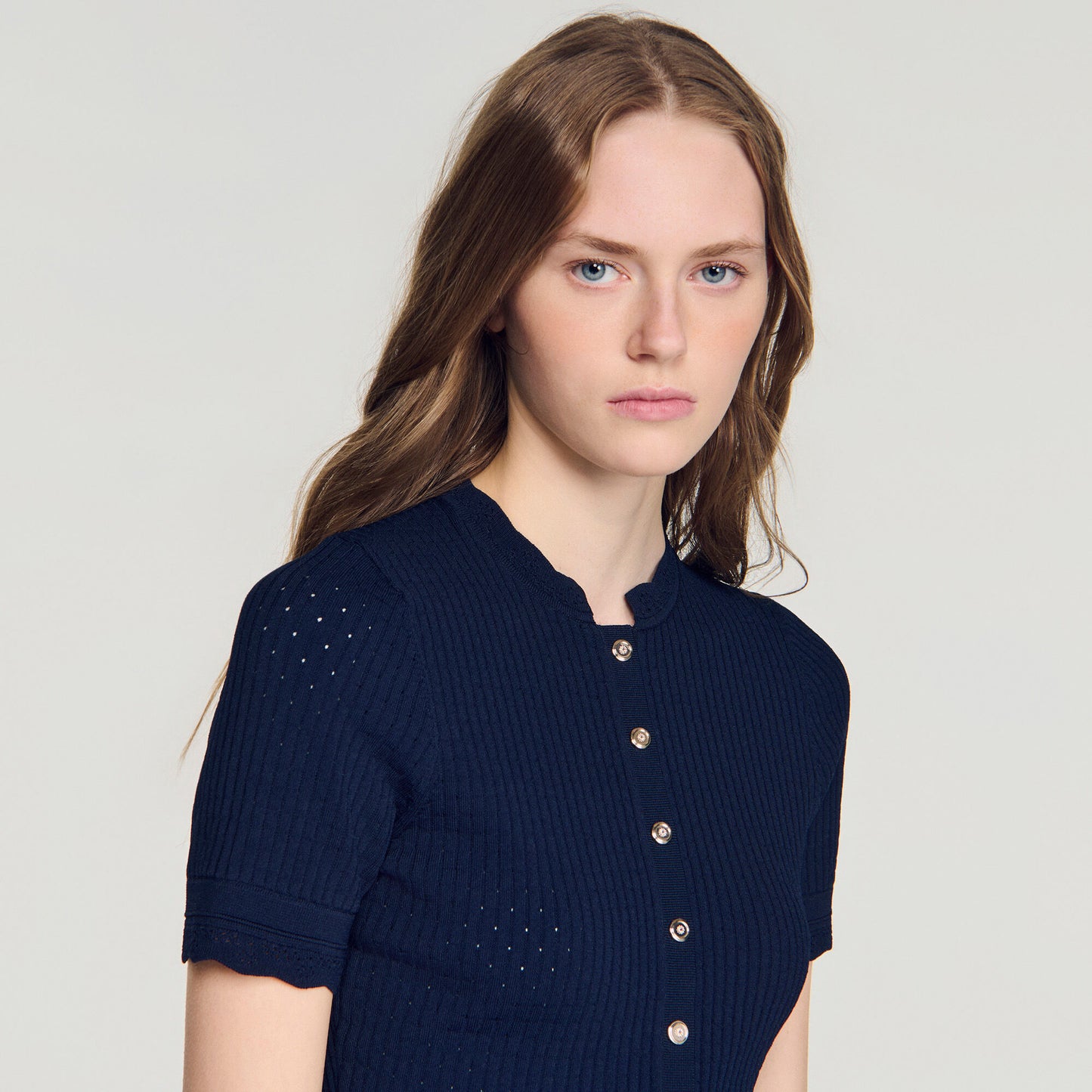 Cropped pointelle knit cardigan