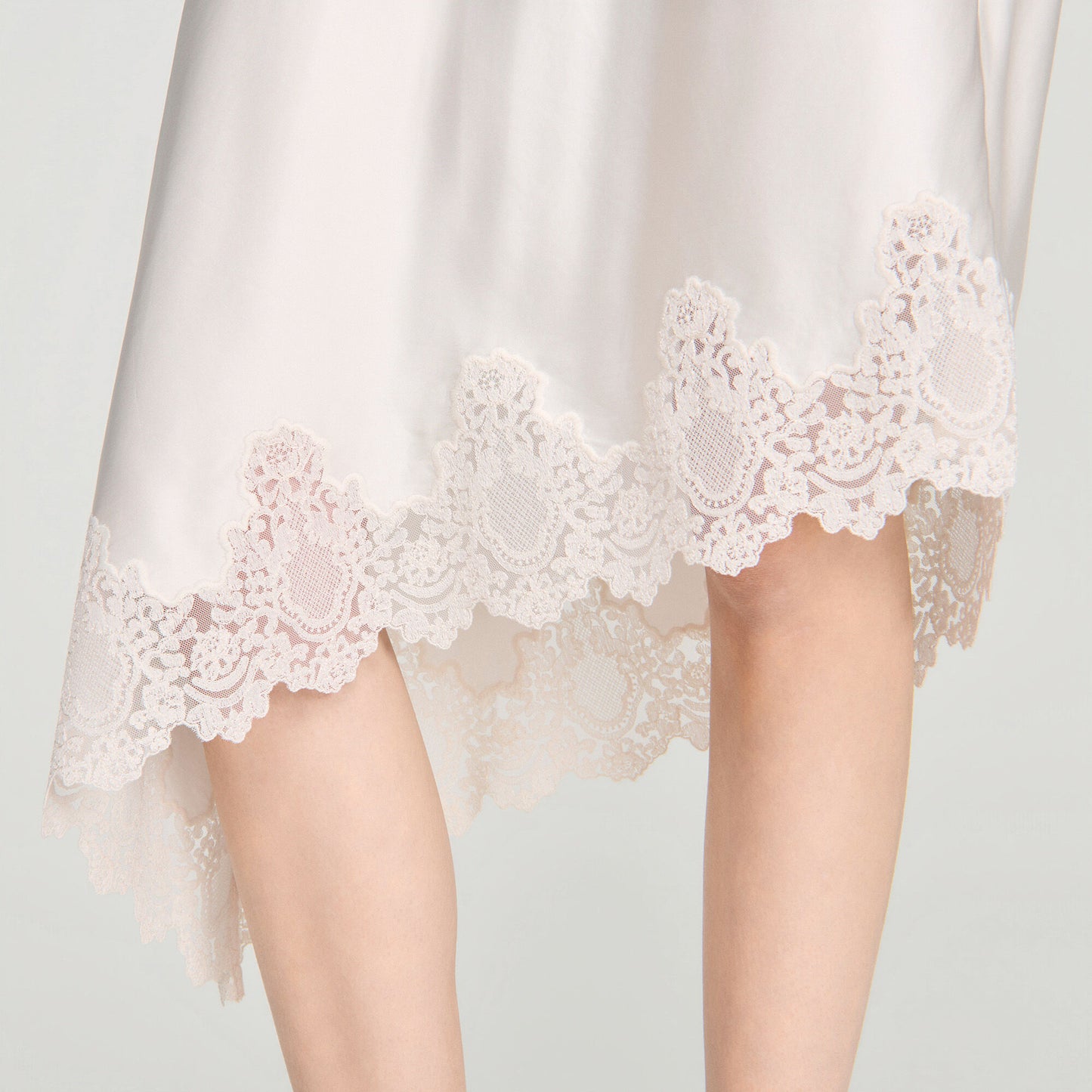 Asymmetrical satin skirt with lace