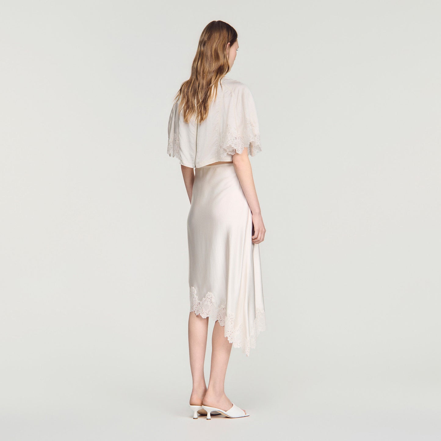 Asymmetrical satin skirt with lace