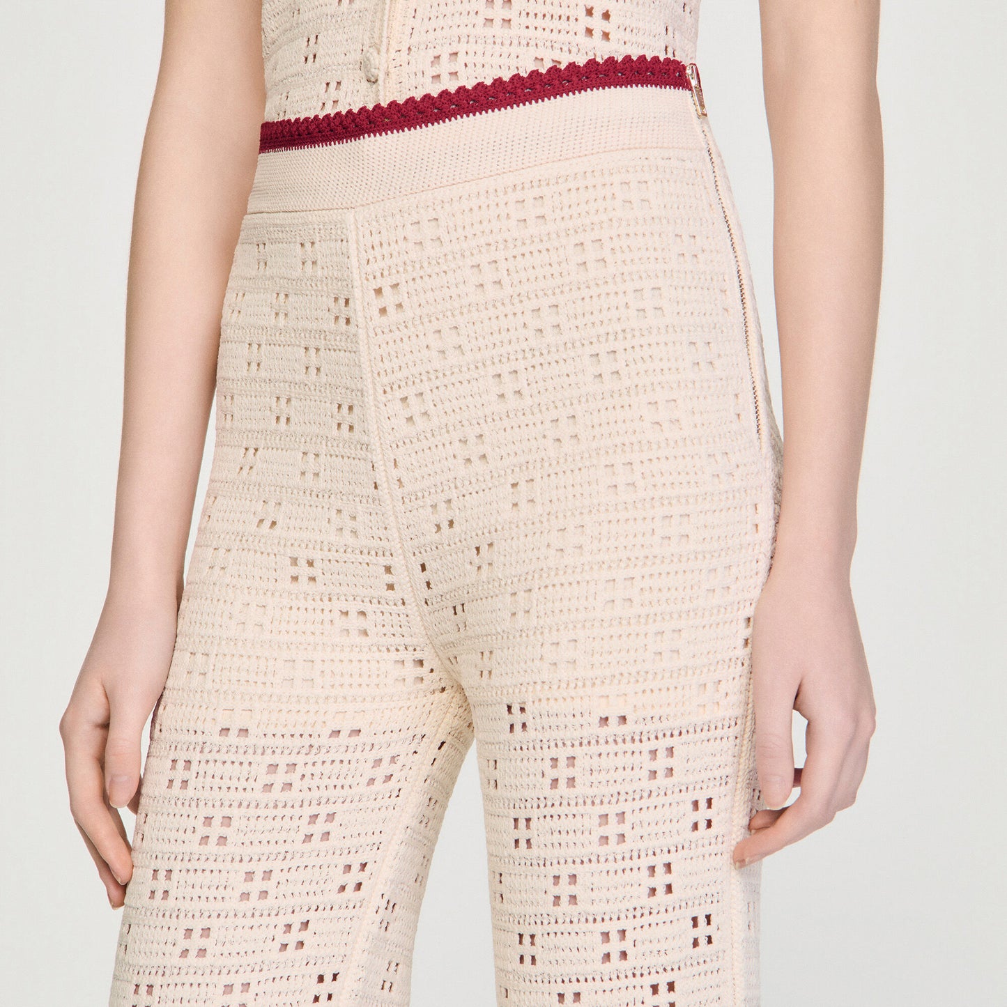 Crochet-look knit trousers