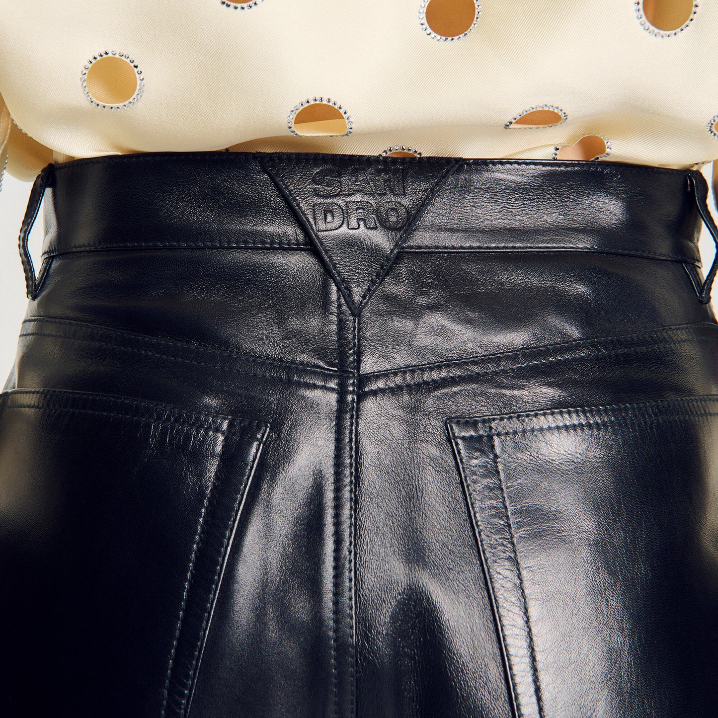 Leather barrel-leg trousers