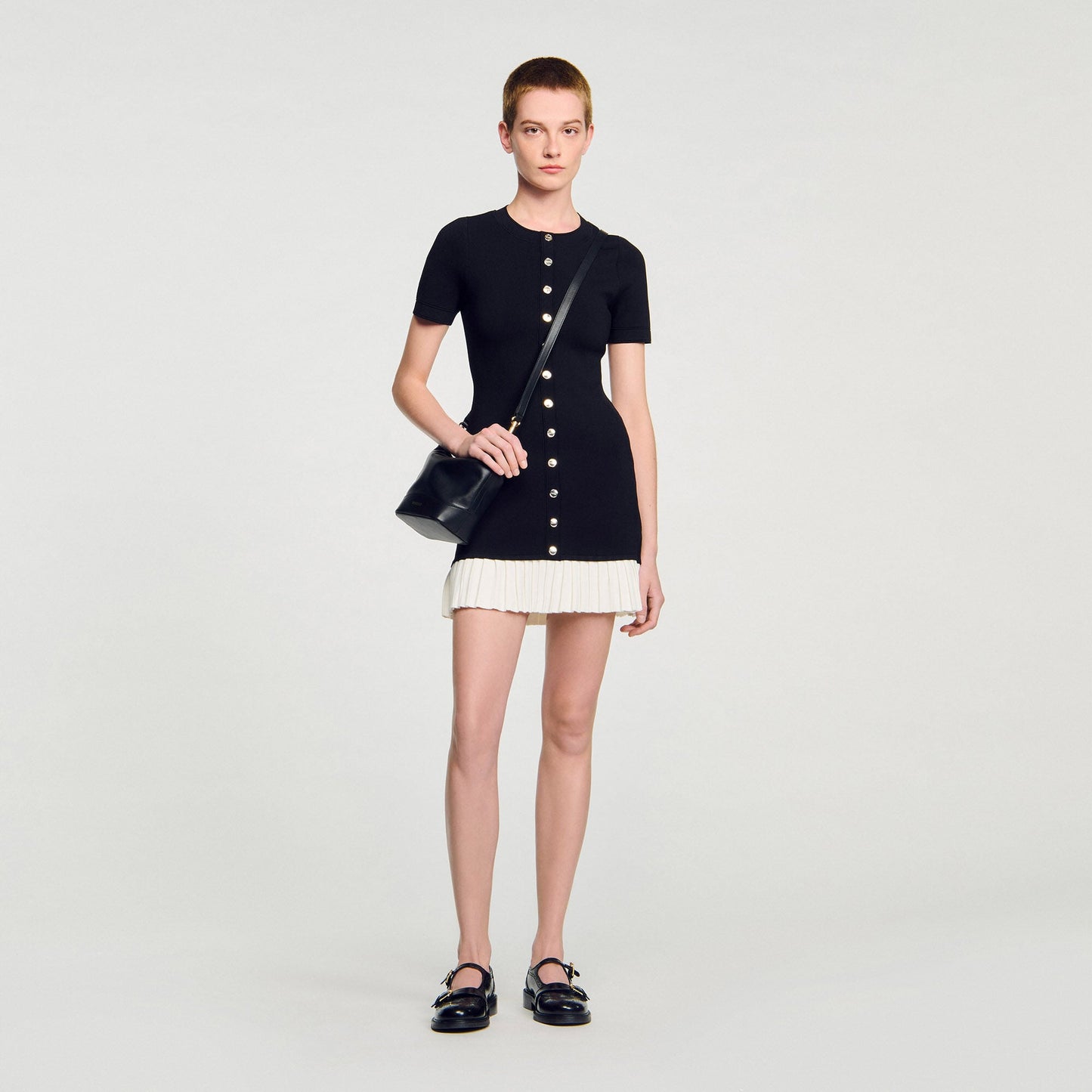 Short knit dress with ruffle
