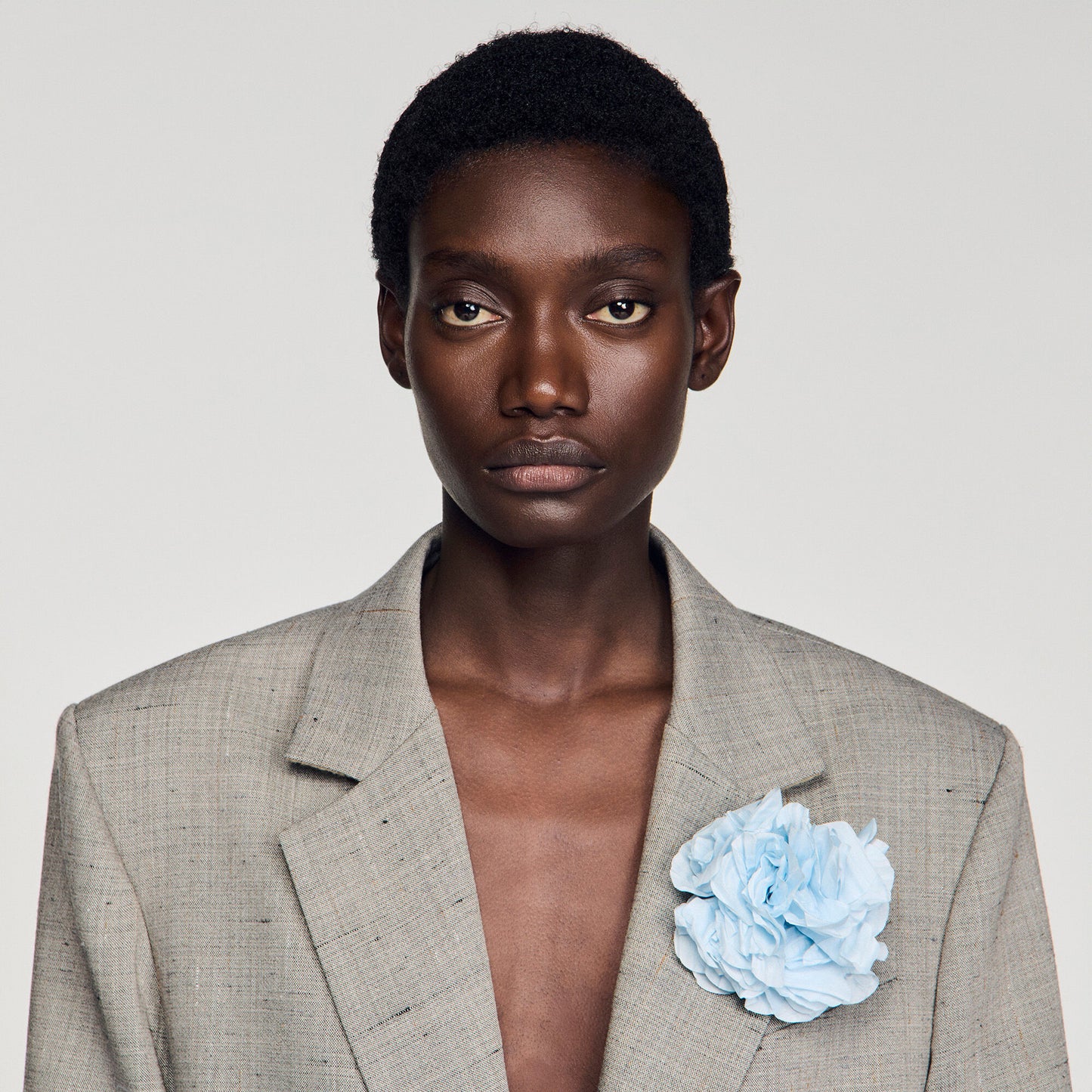 Check wool jacket with brooch