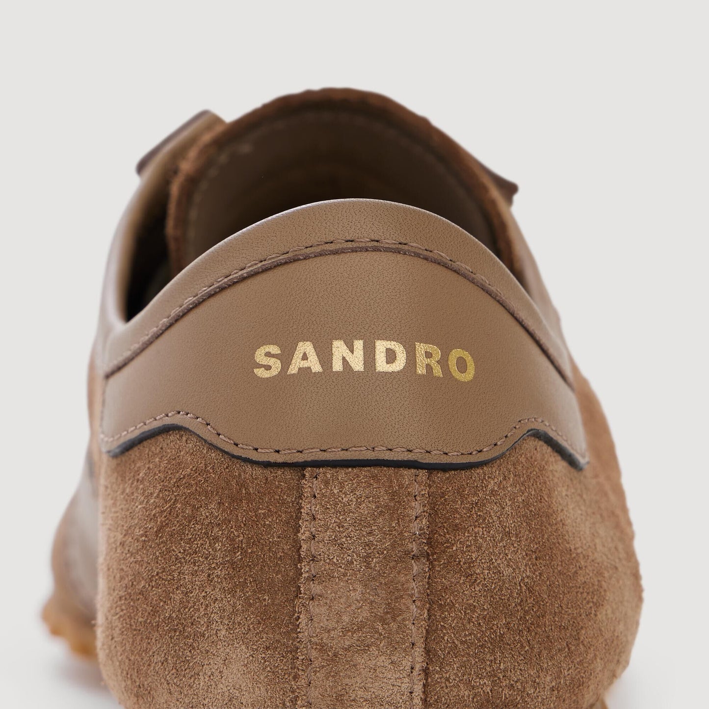 Low-top leather and suede trainers