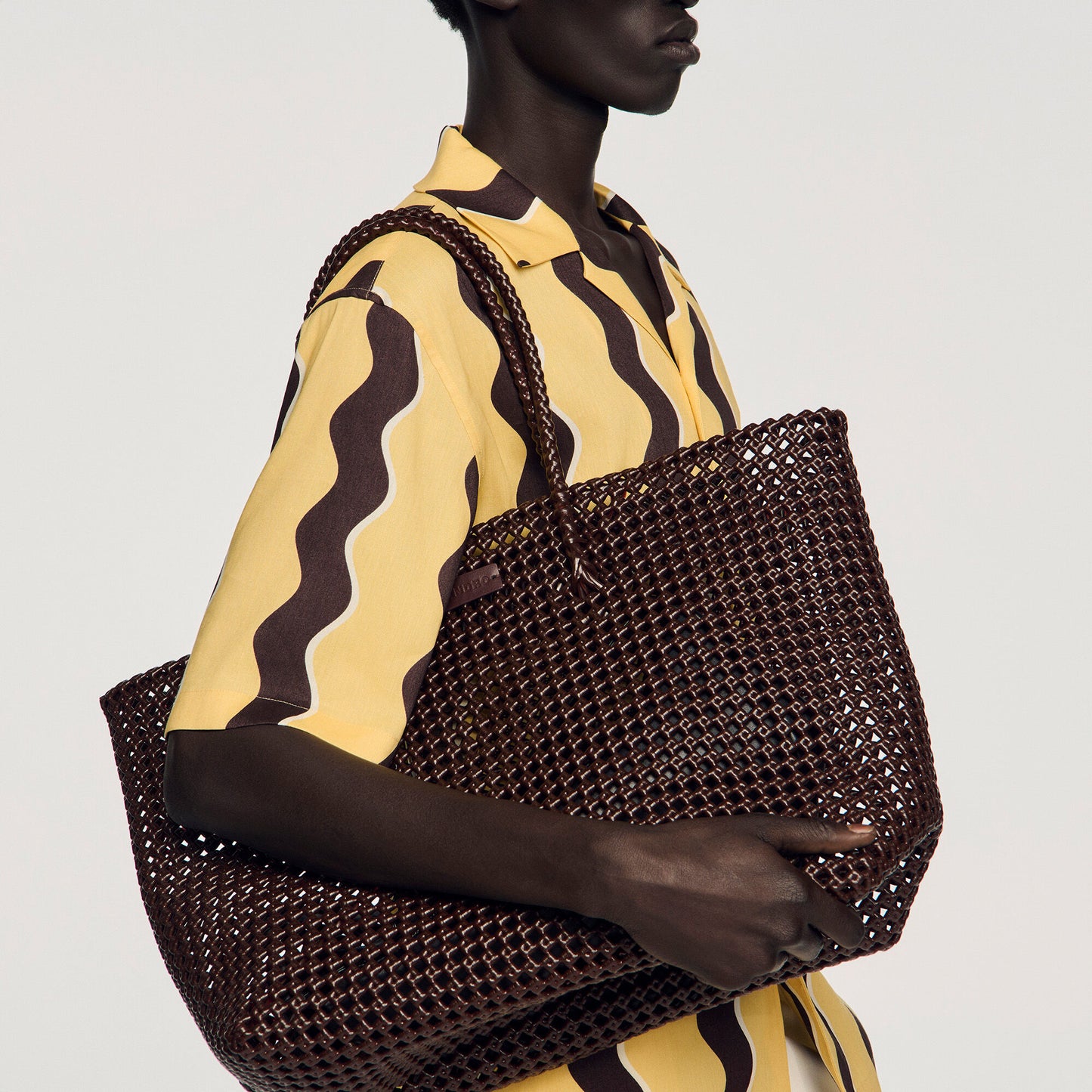 Woven tote bag with patch