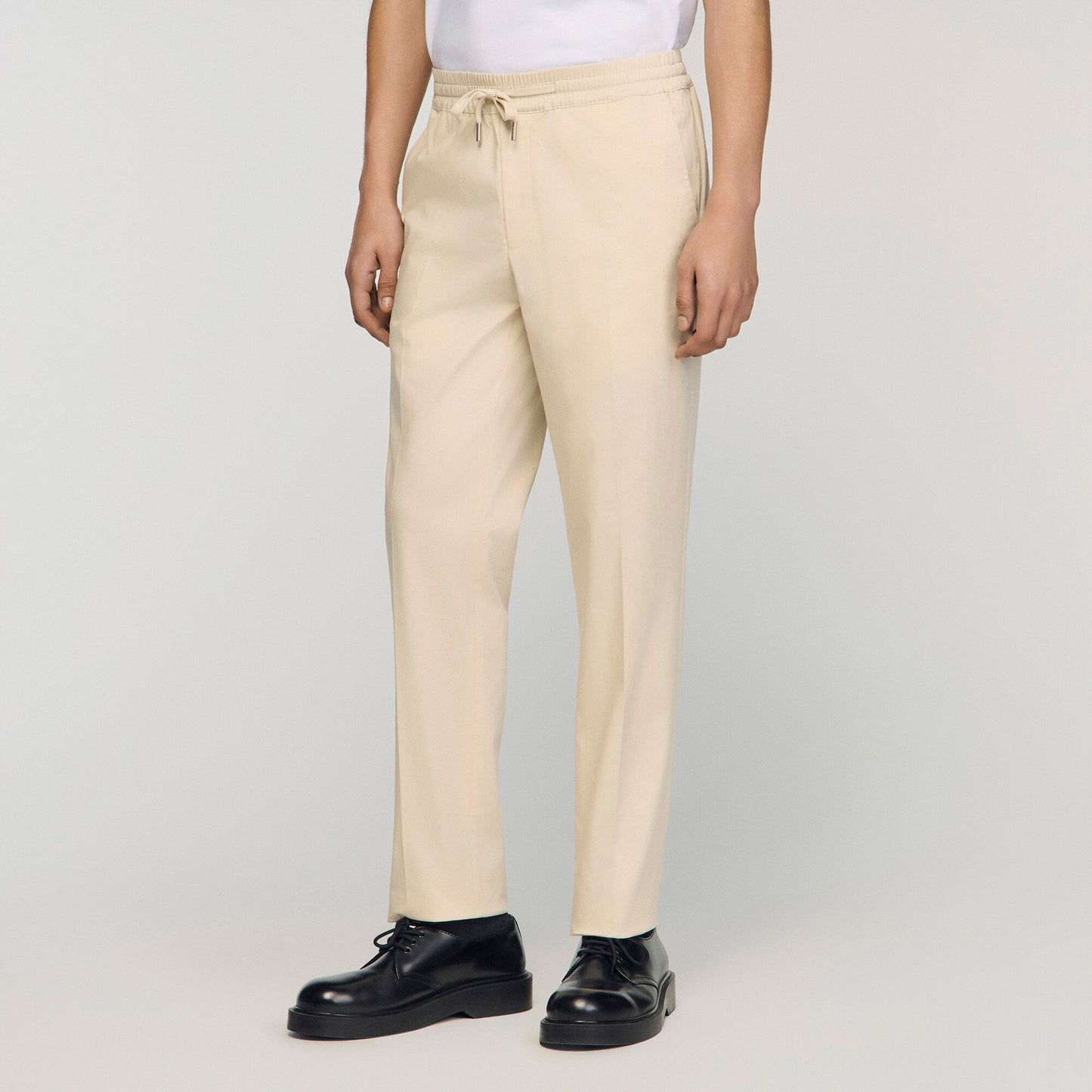 Elasticated straight-leg trousers