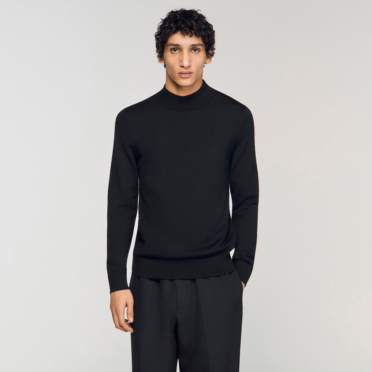 Wool jumper with a high collar