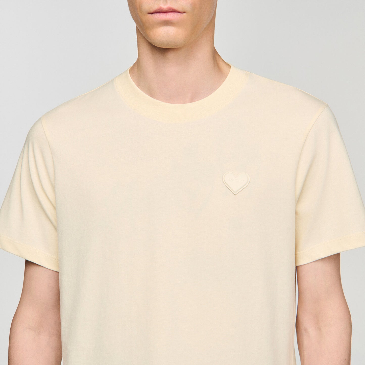 T-shirt with heart patch