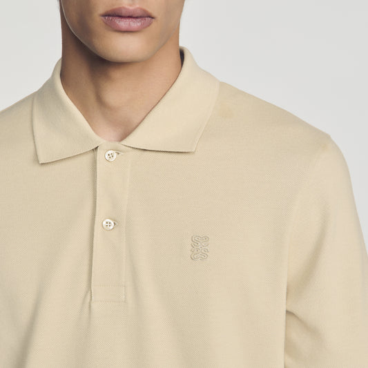 Cotton polo shirt with leather logo