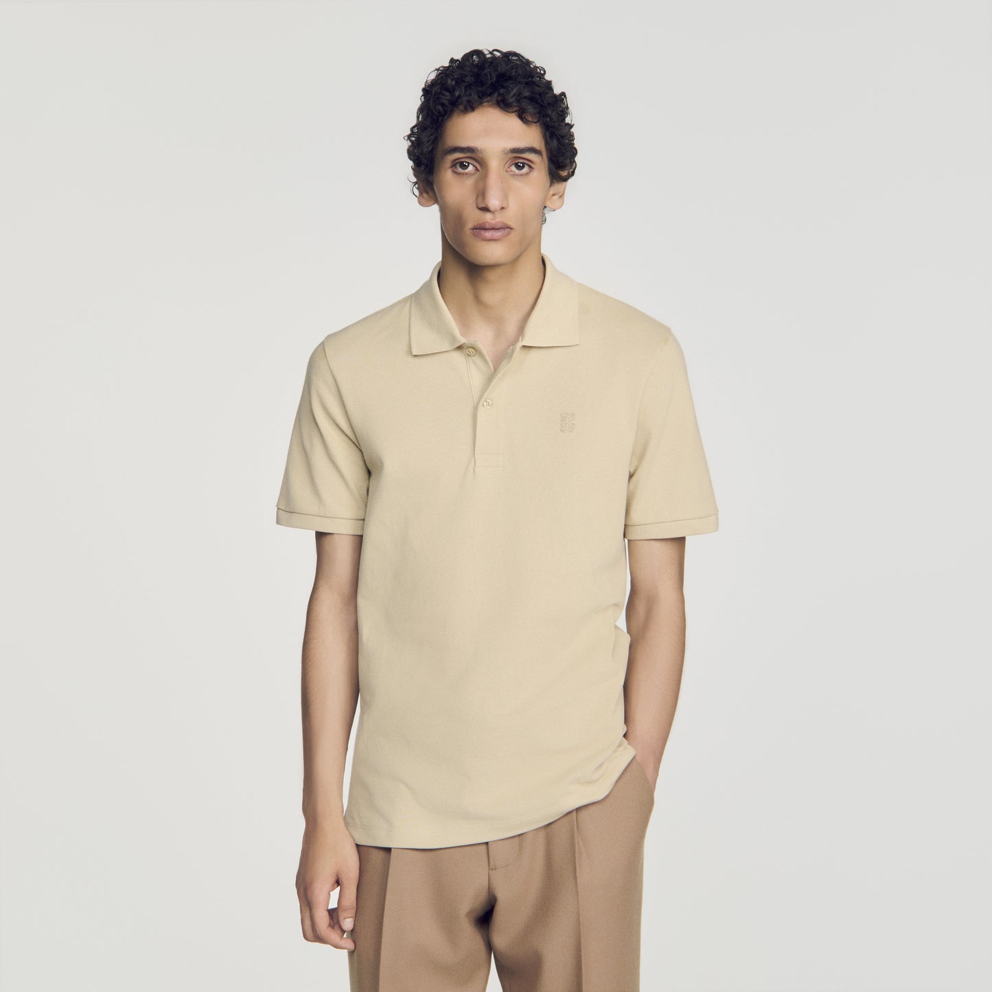 Cotton polo shirt with leather logo