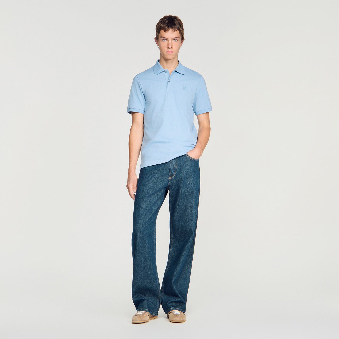 Cotton polo shirt with leather logo